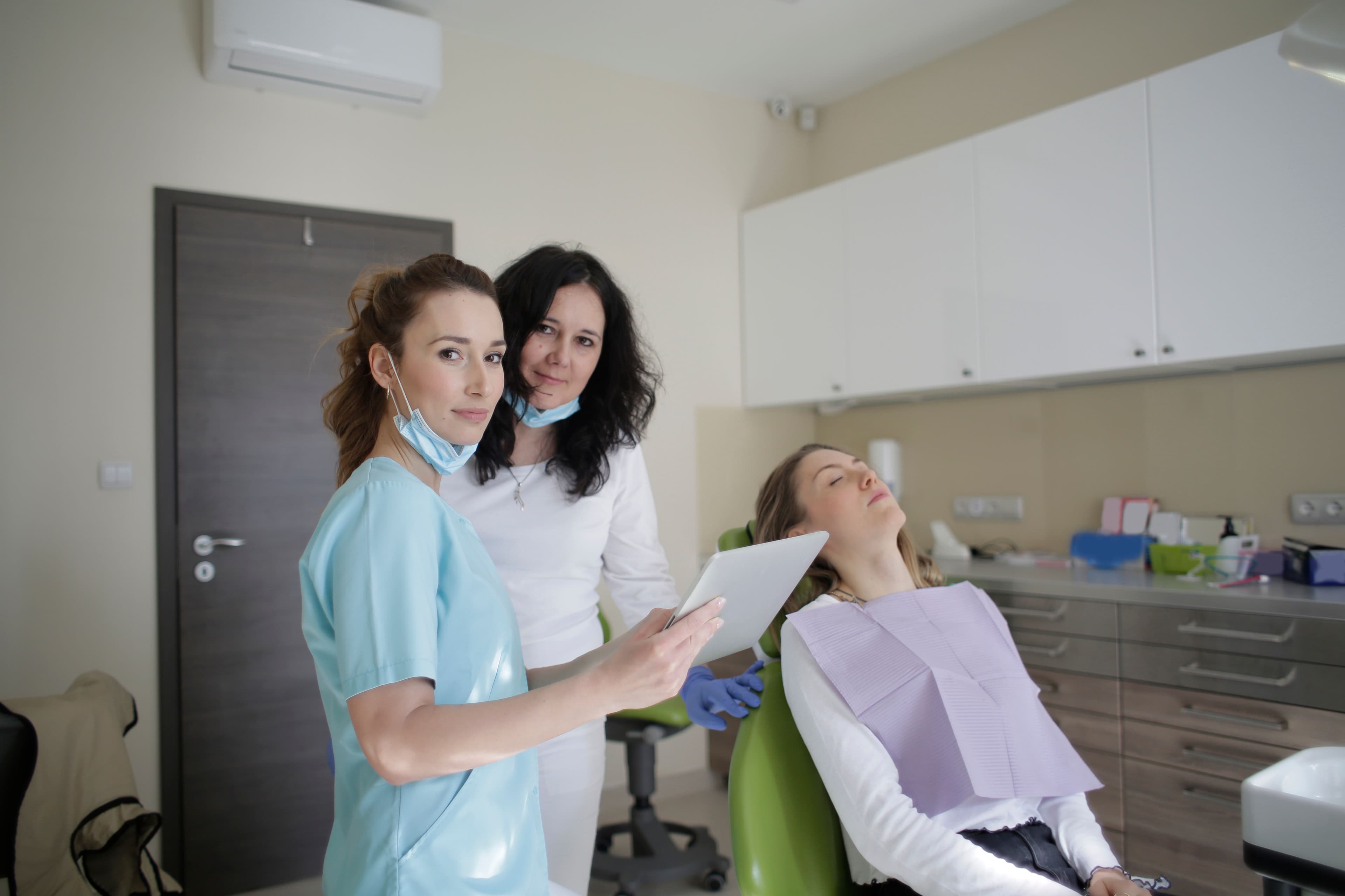 Healthcare staff member with patient records in clinic