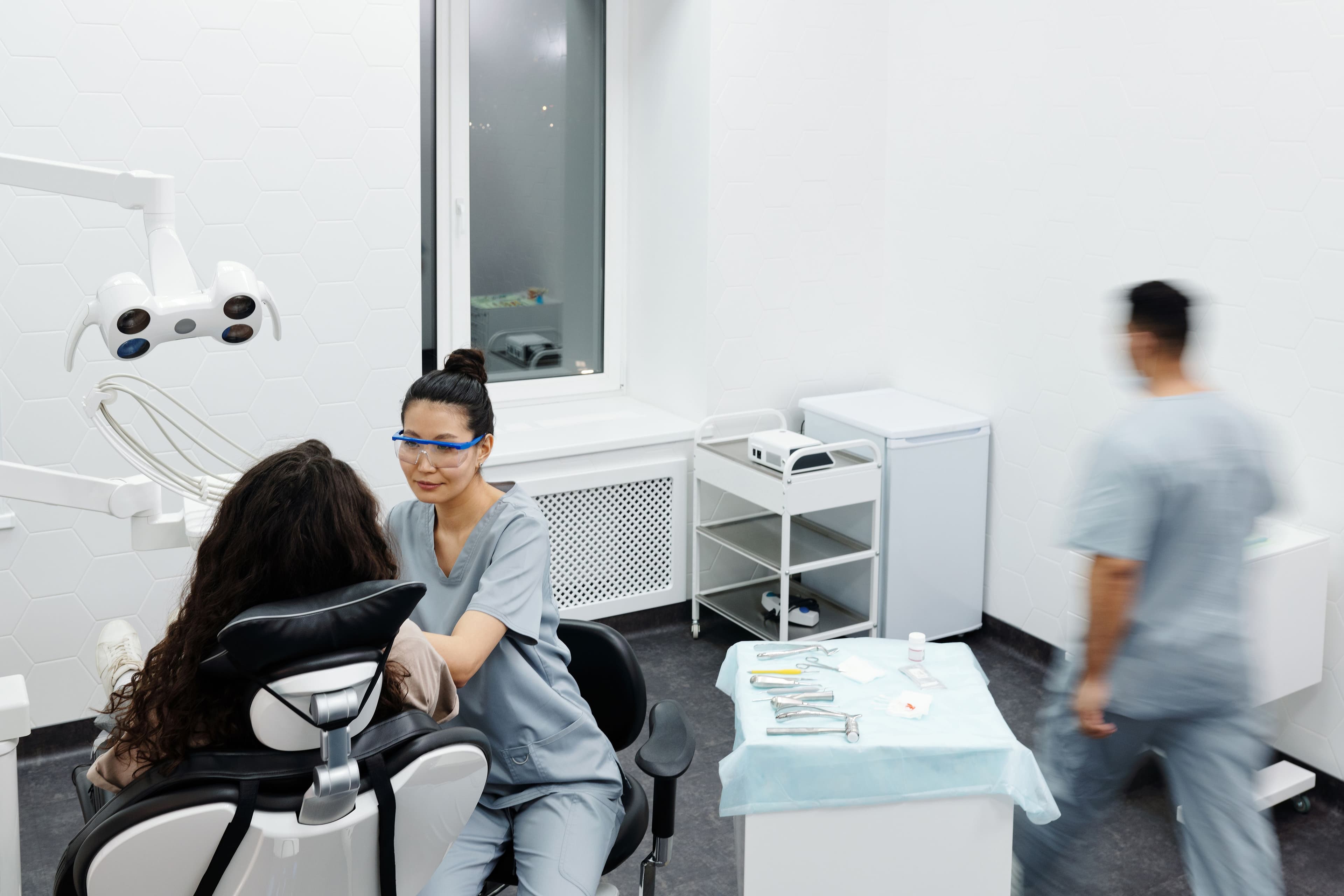 Dentist consulting with a patient in a clinic