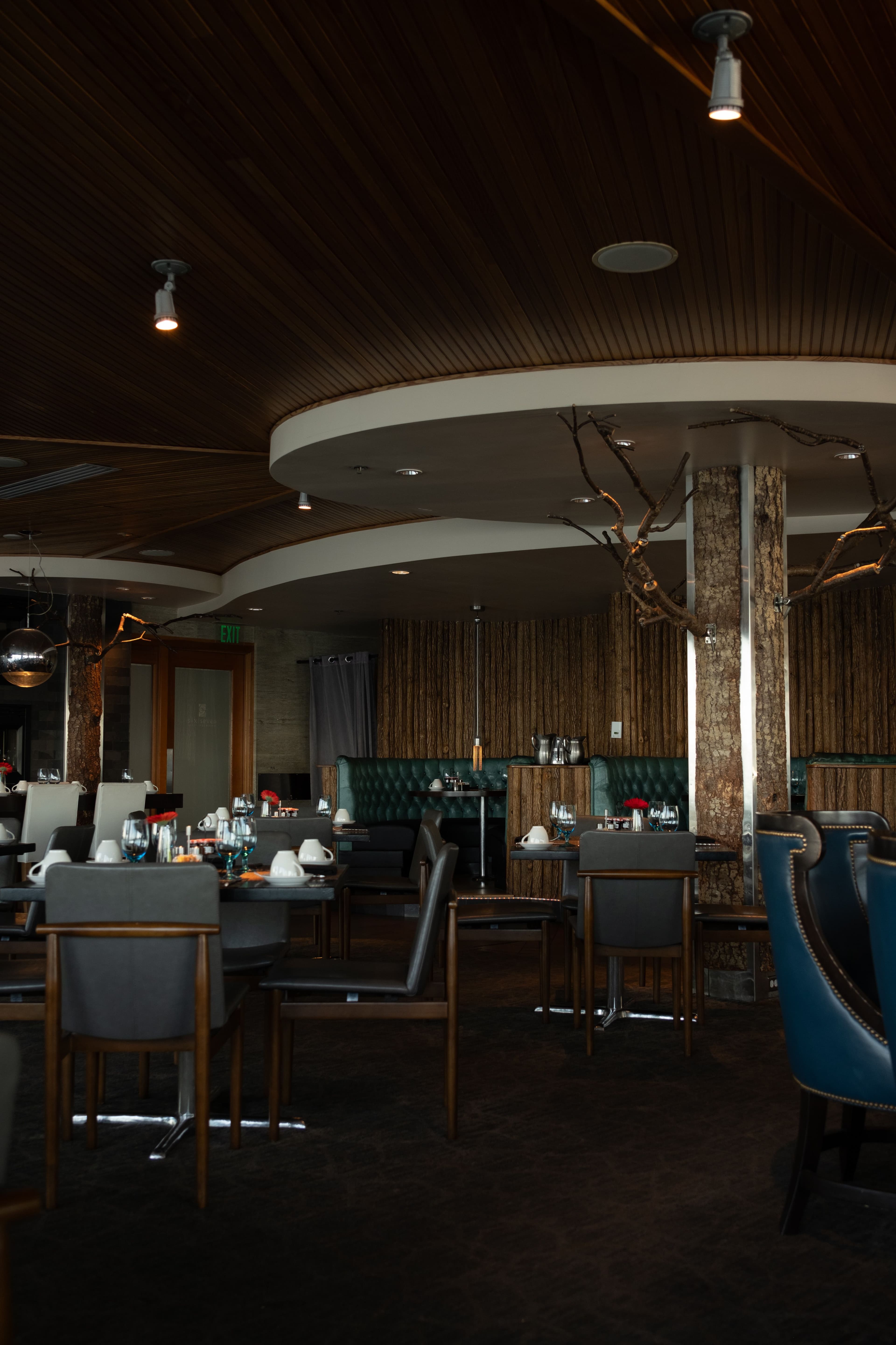 Premium restaurant dining room with ambient lighting